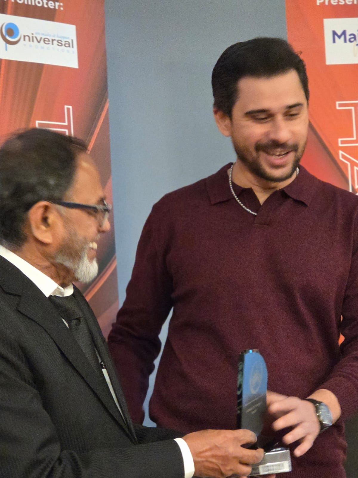 On stage at the Tabish Hashmi show in Sydney, where the Association's Engineering Industry Award was presented