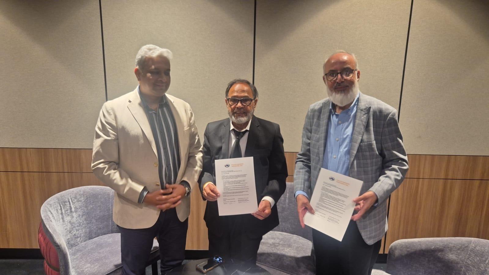 The Memorandum of Understanding between the Pak-Aus Engineers Association and SGS Pakistan being signed